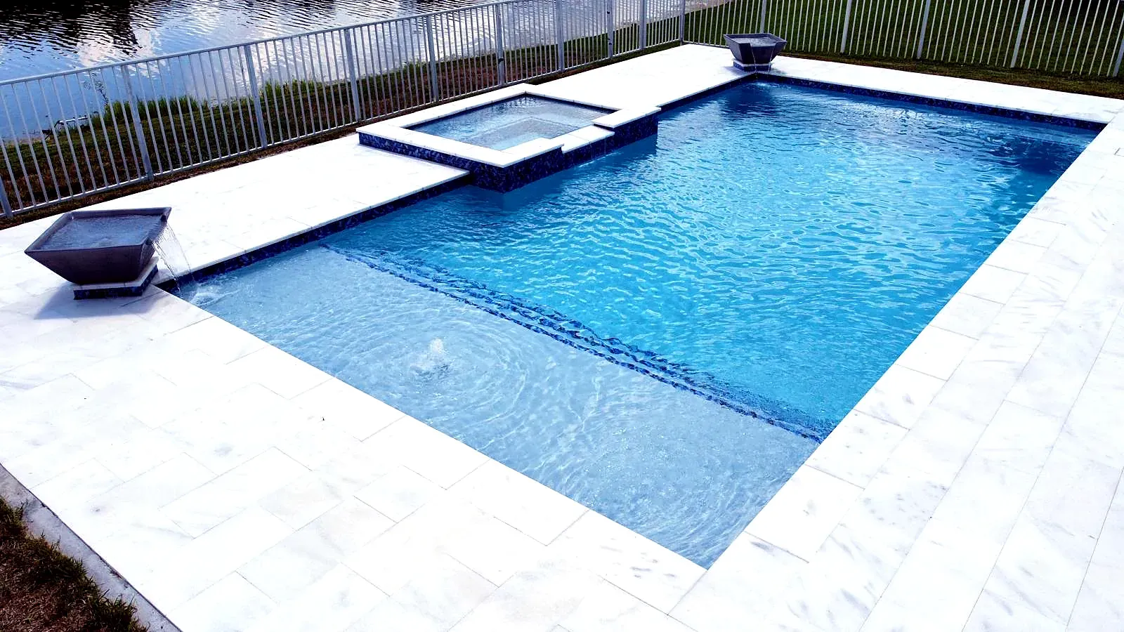 Geometric pool with waterline tile