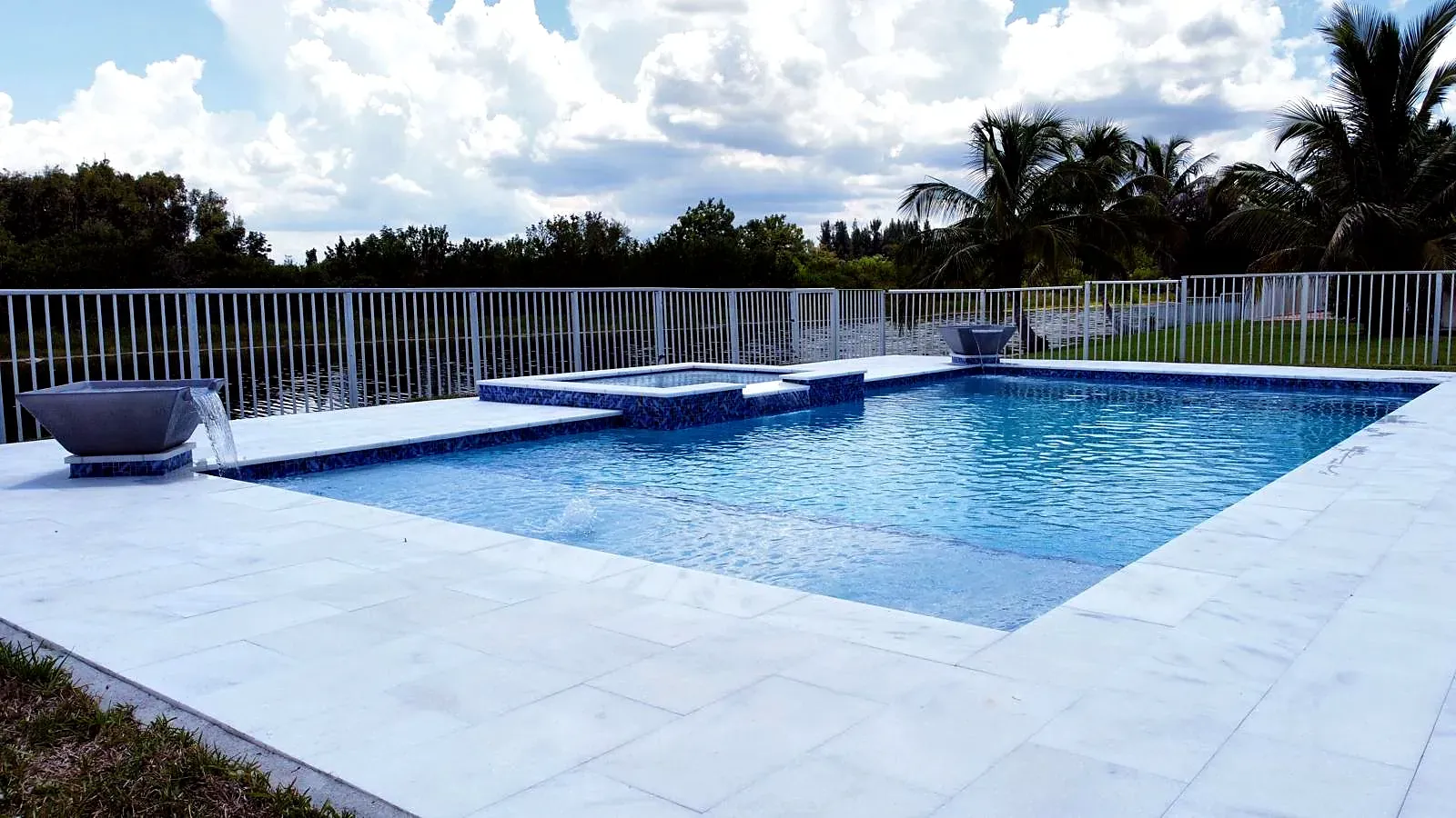 Geometric pool with waterline tile